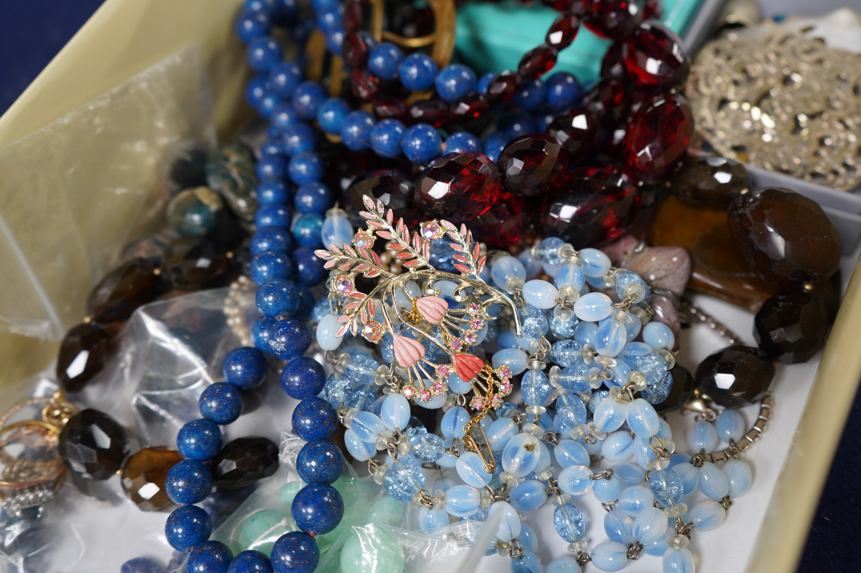 A quantity of assorted mainly costume jewellery including necklaces, rings, pendant, etc. Condition - fair.